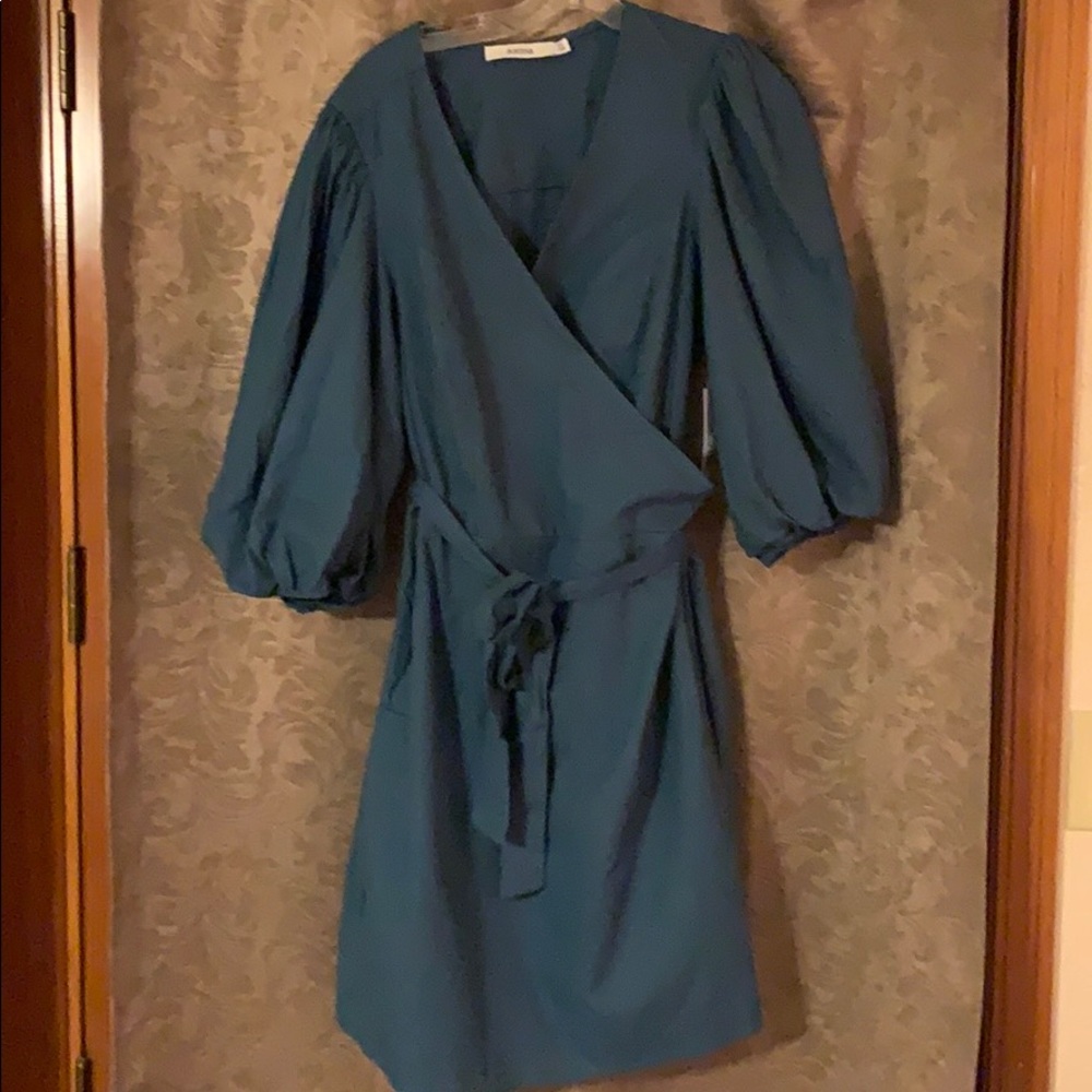 Blue/teal wrap style dress.